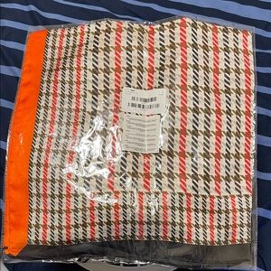 Plaid Patterned Blanket with Orange Accent